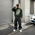 Model wearing green Knitted S Sweater - square format